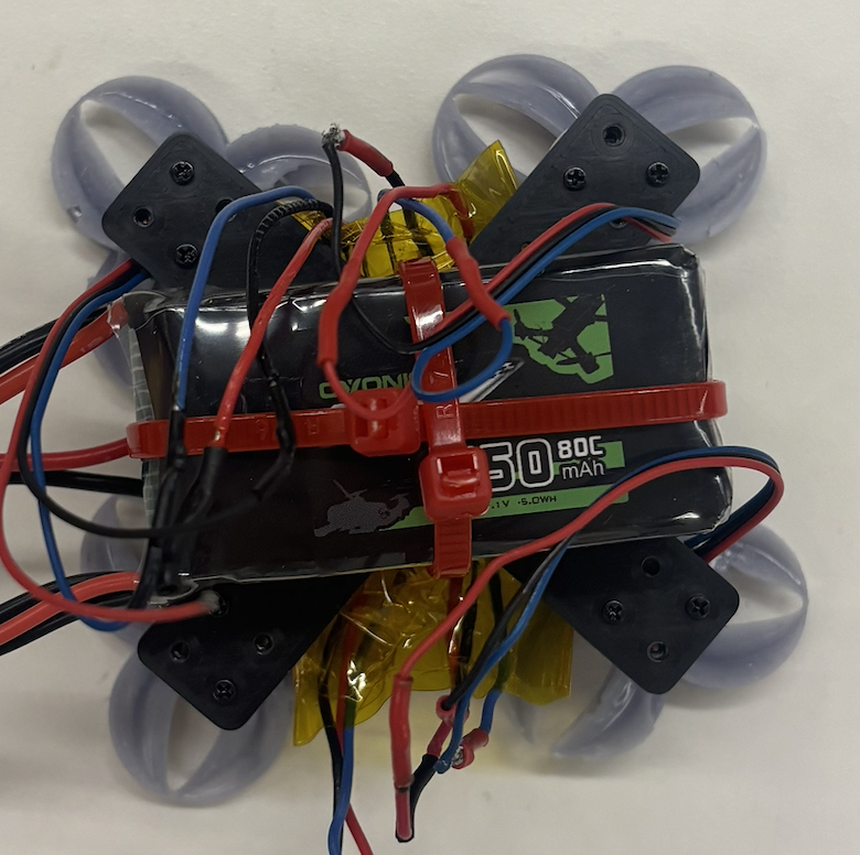 LiPo battery strapped to the frame diagonally with cable binders