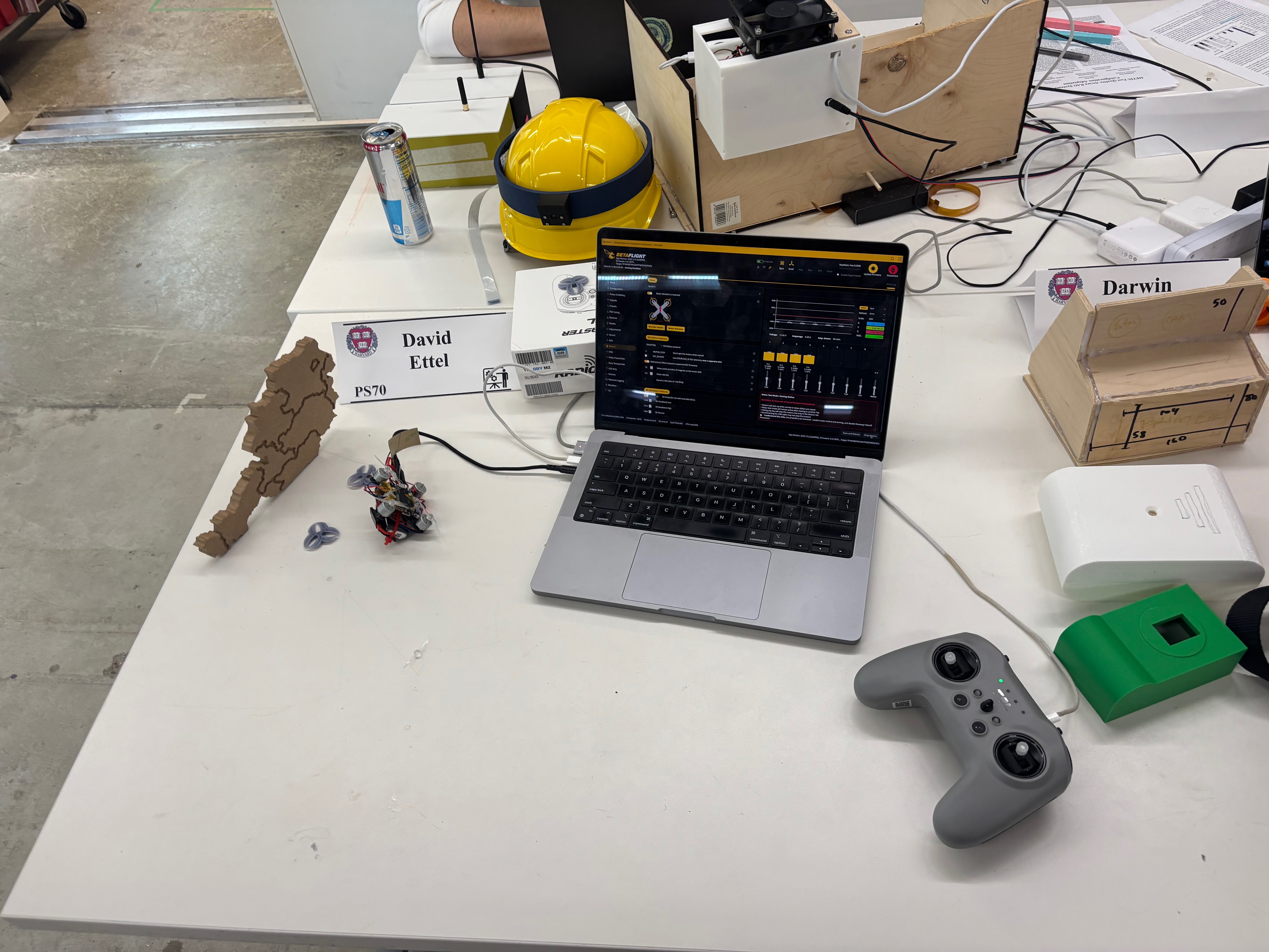 Whole setup: drone, flight control debugging software, and remote control